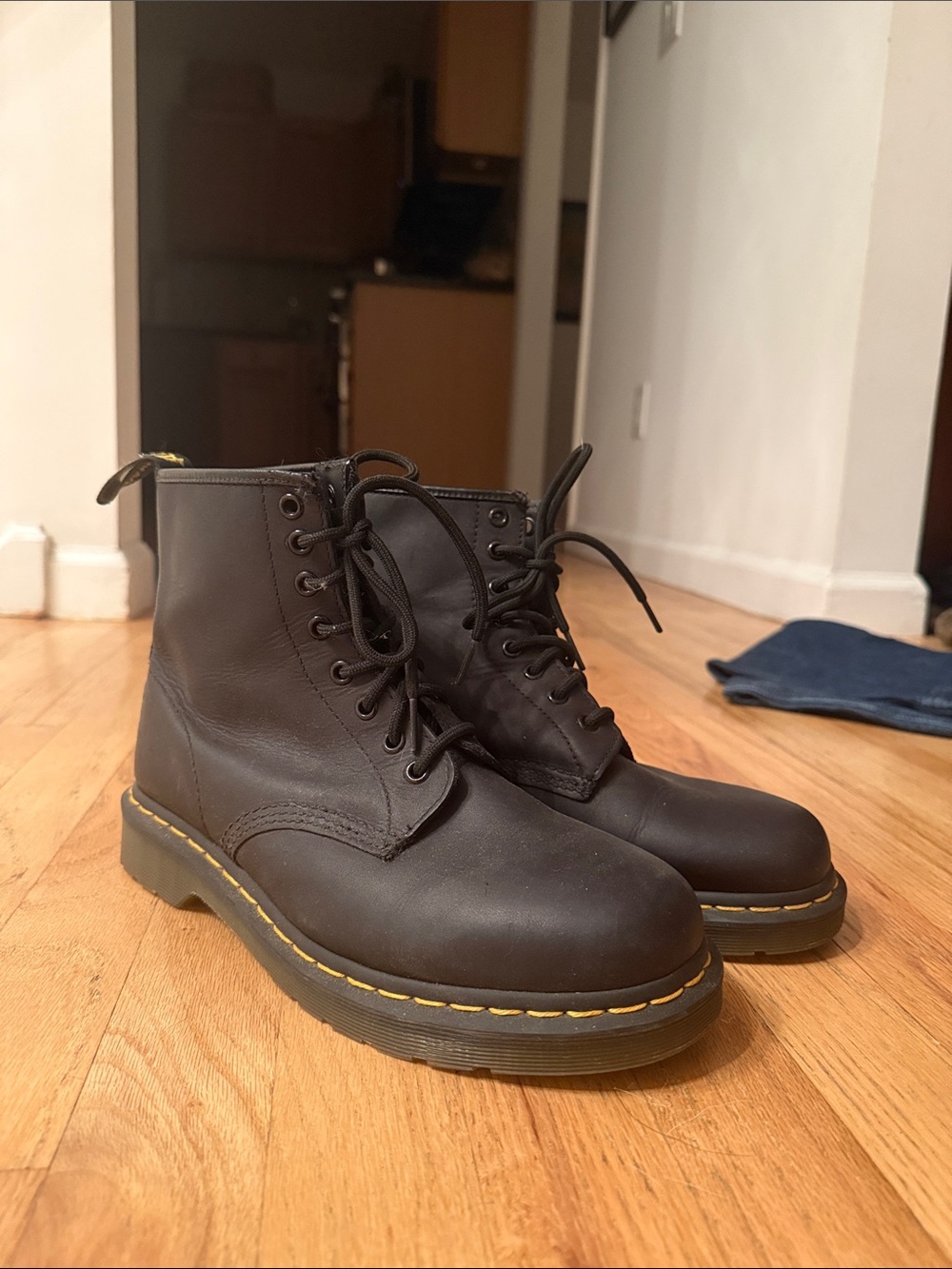 Dr. Martens Black Leather Lace-Up Women’s Boots with Yellow Welt Stitching